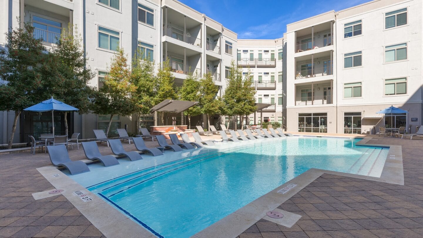 Lounge by the water in the 85-foot wide Aqua Lounge. at Eleven by Windsor, Texas