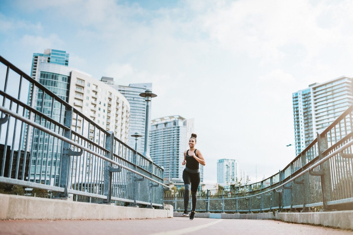 Woman Running at Windsor South Congress, Austin, TX, 78745