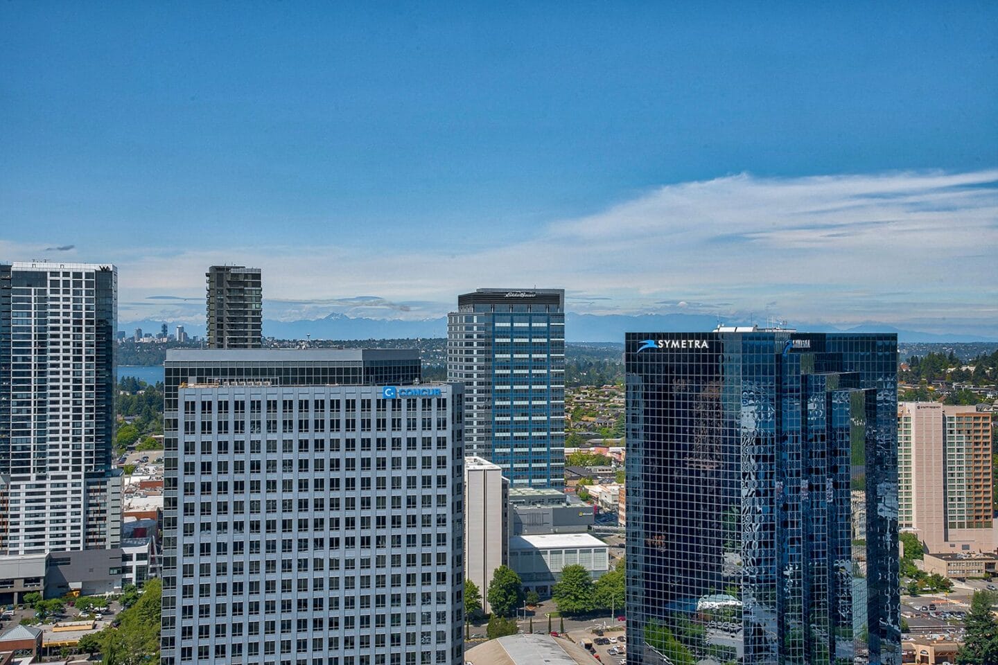 Skyline, mountain, and water views from penthouse at The Bravern, Bellevue, WA