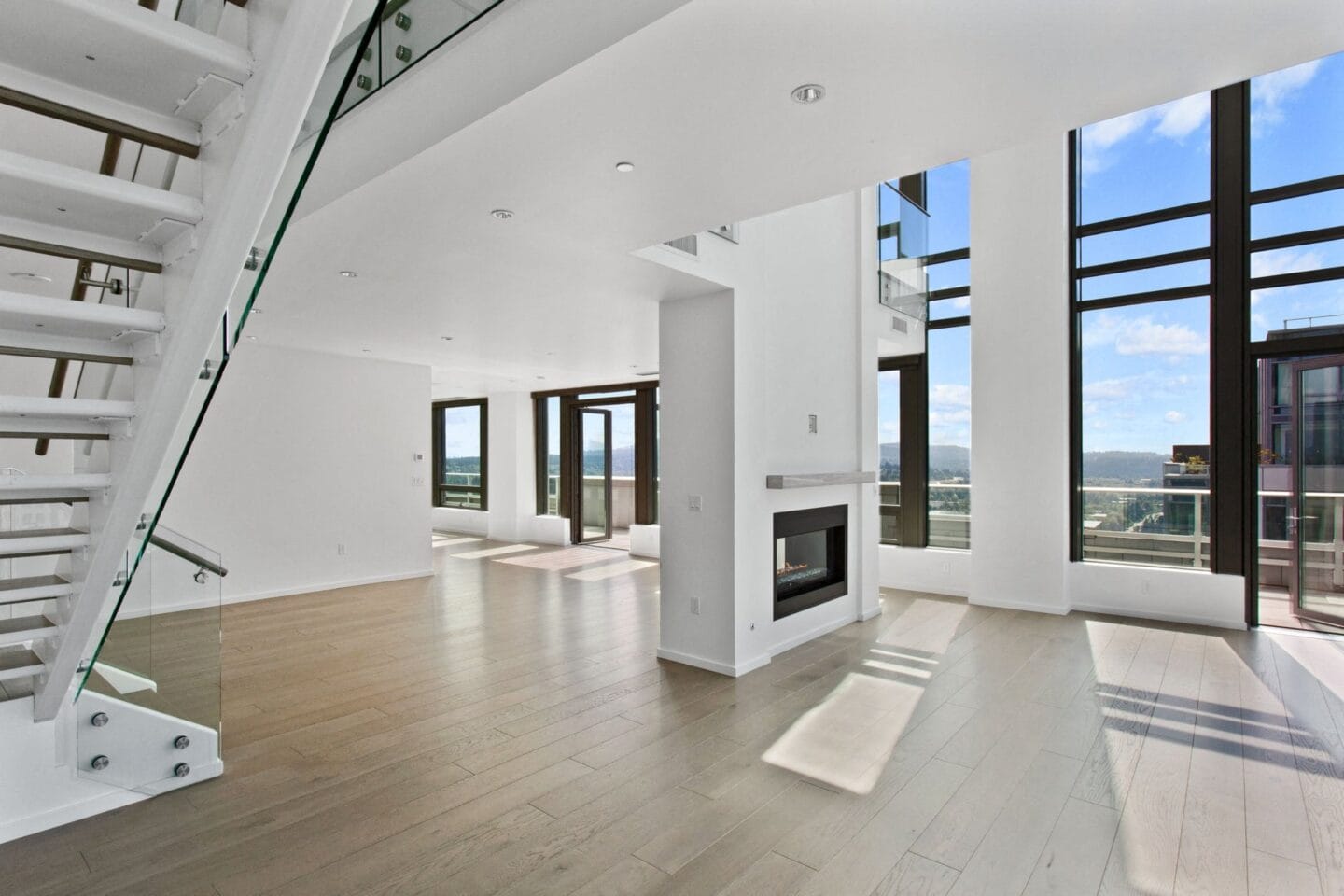 A view of the living room from the stairs at Bravern, Bellevue, Washington