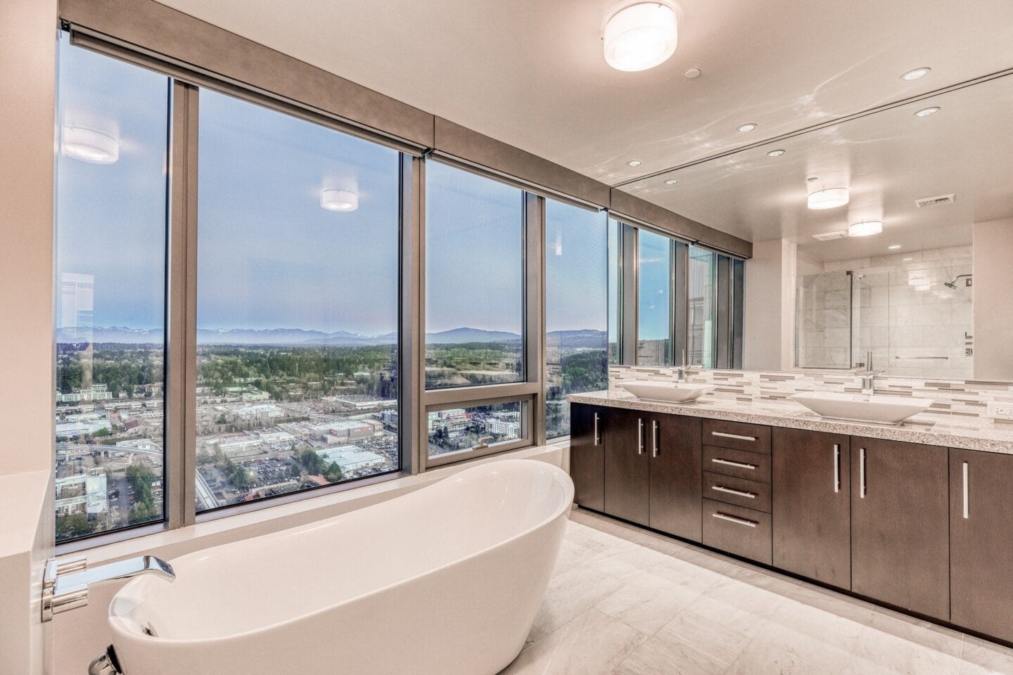 Double vanity with soaking tub at The Bravern