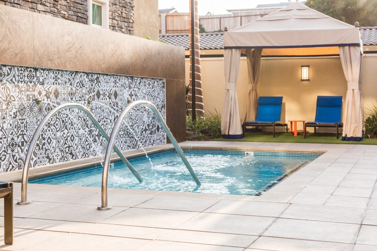 spa and poolside cabanas at Valentia by Windsor, La Habra