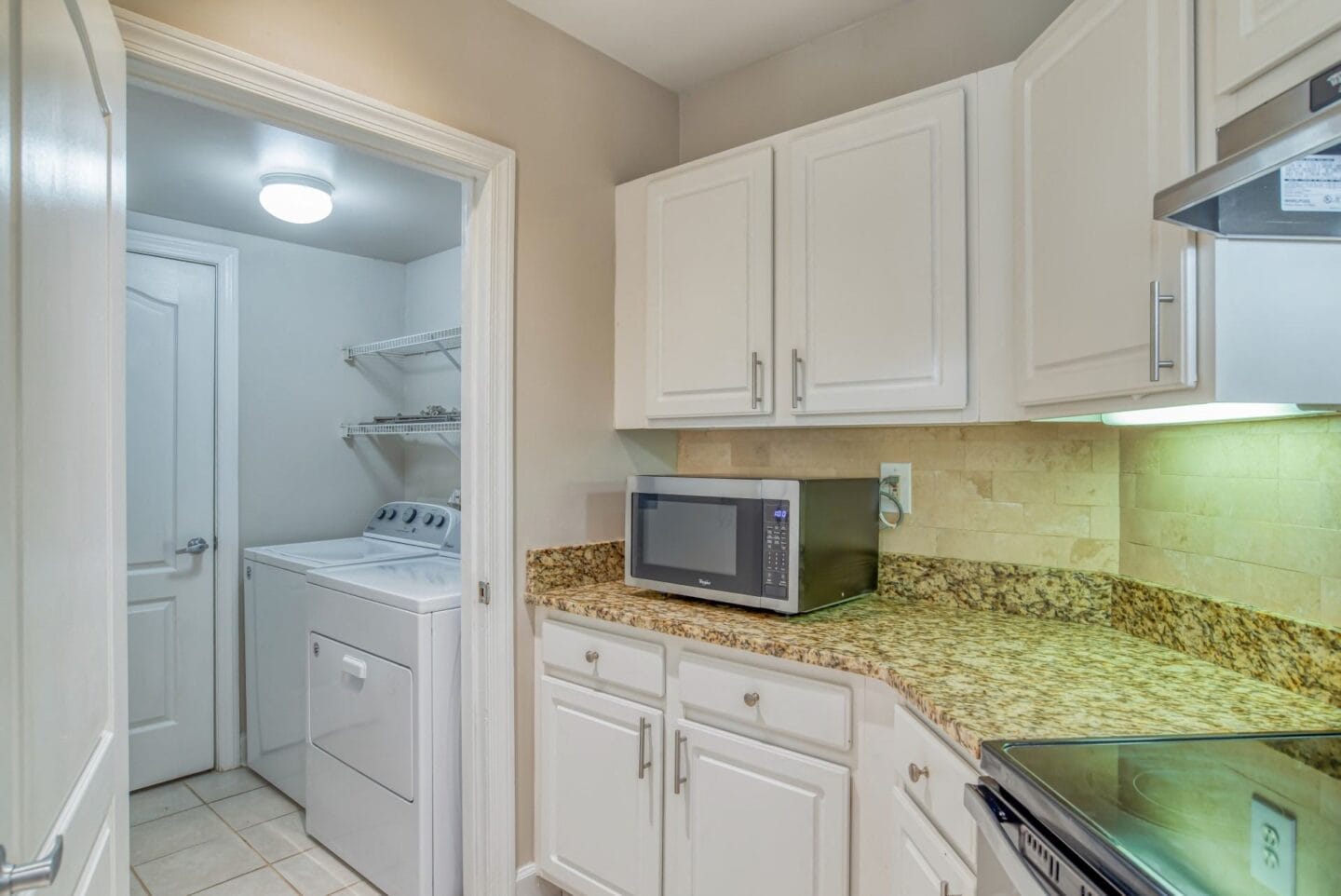 Kitchen with washer dryer  at Windsor at Midtown, Atlanta, GA