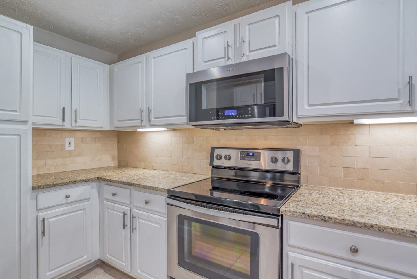 Kitchen with white cabinets  at Windsor at Midtown, Atlanta, GA