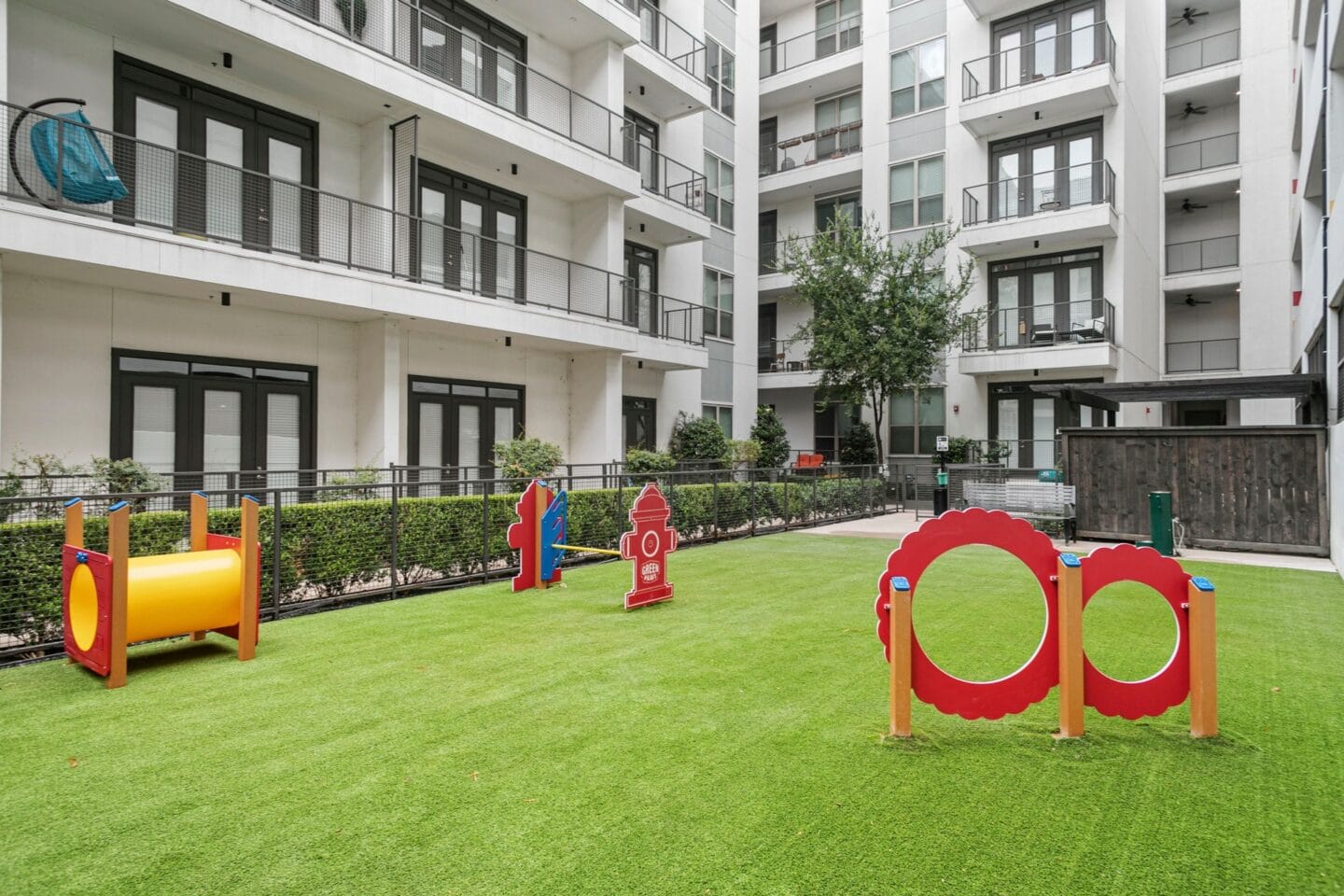 Dog park with agility equipment  at Windsor CityLine, Richardson, Texas