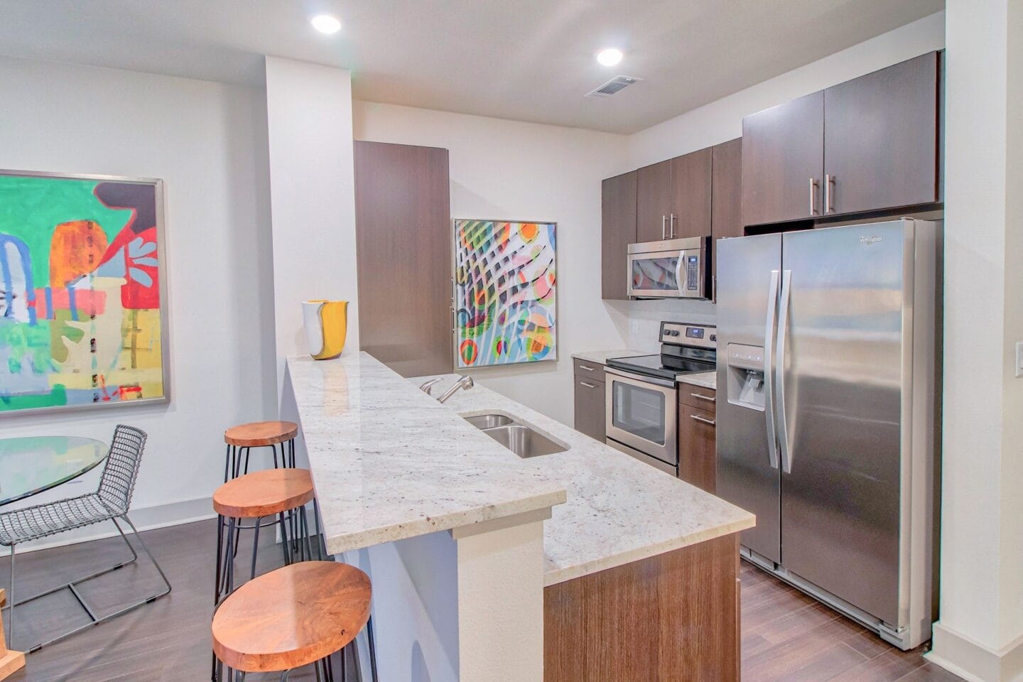 Granite countertops with natural stone backsplash