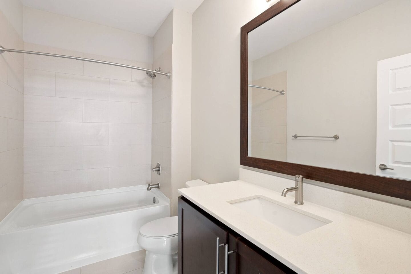 Bright bathrooms with large mirrors  at Windsor Morningside, Atlanta, GA