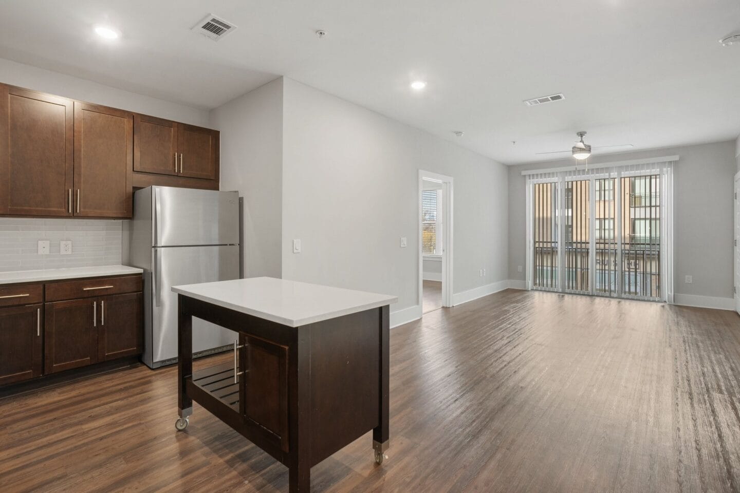 Overhead lighting in kitchen, dining and living areas  at Morningside Atlanta by Windsor, Atlanta, GA