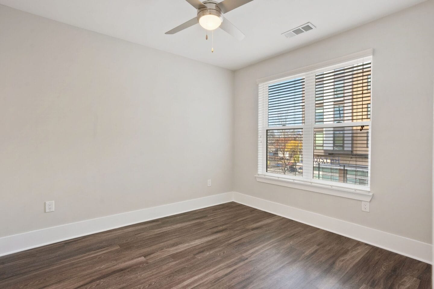 Spacious bedrooms with large windows.