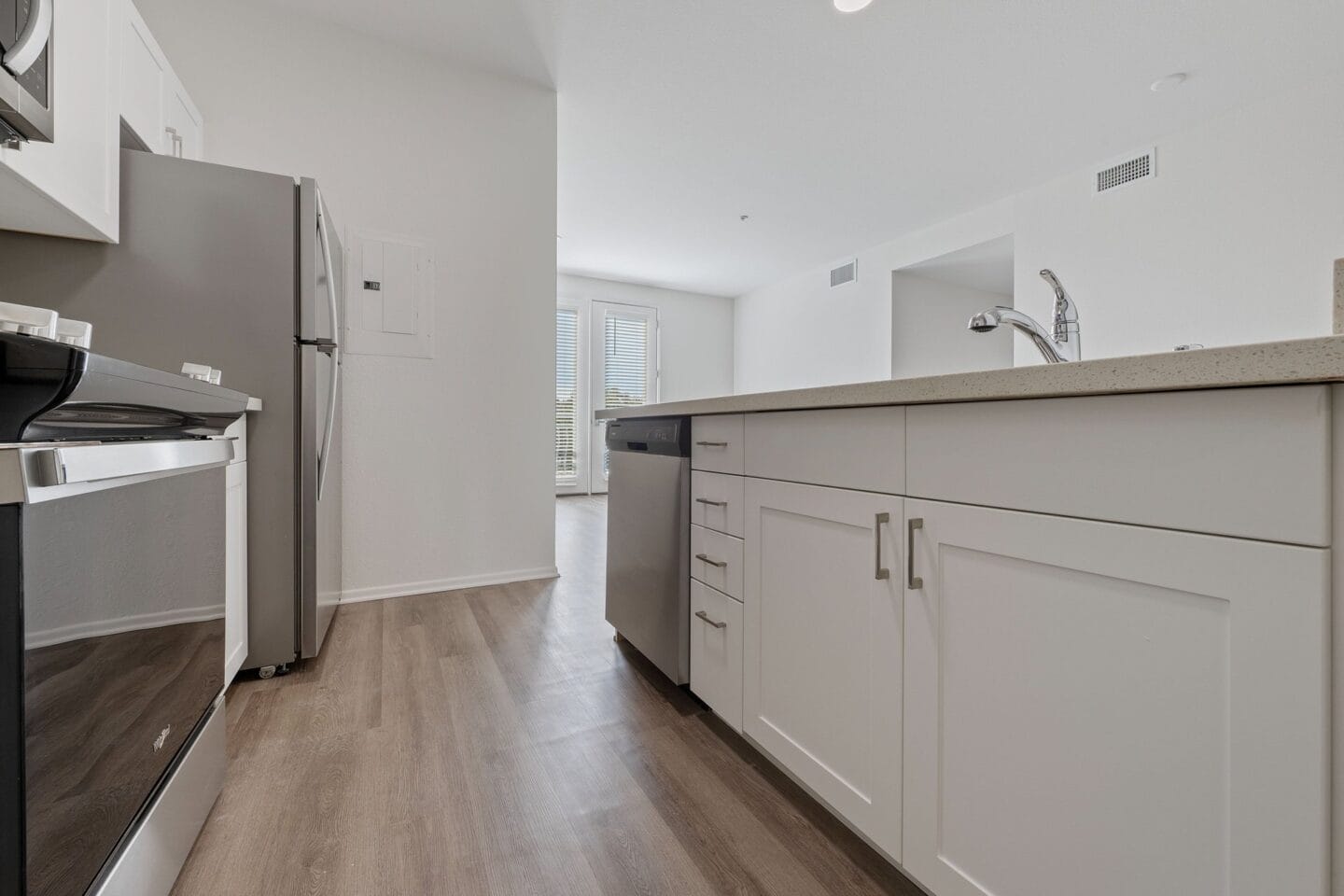 Kitchen with white cabinets at Terraces at Paseo Colorado, California, 91101