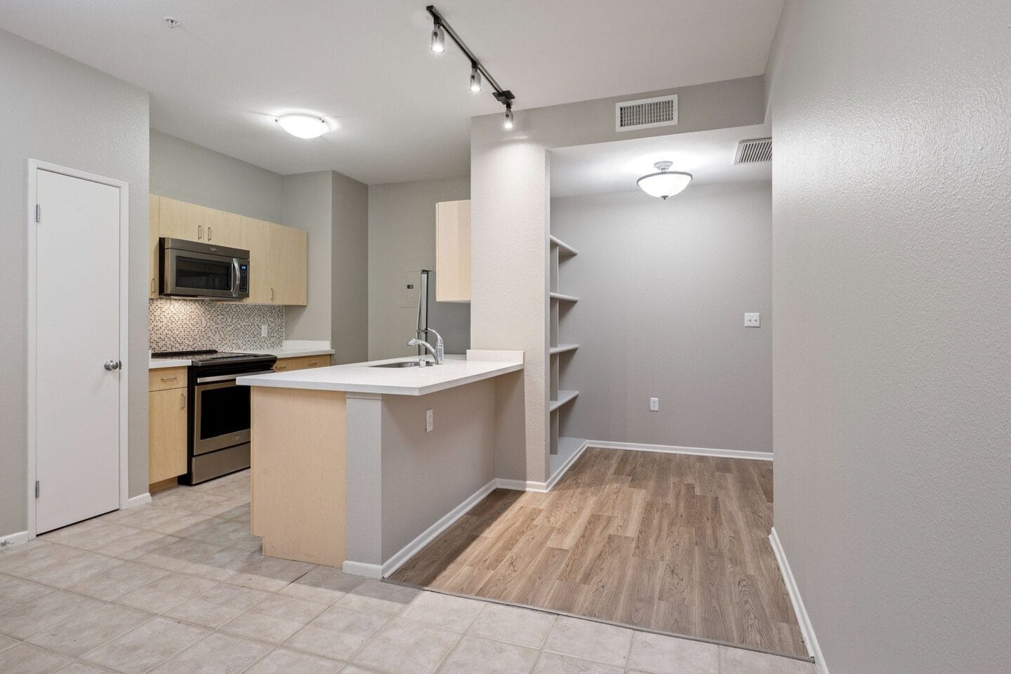 Kitchen wide shot at Terraces at Paseo Colorado, California, 91101