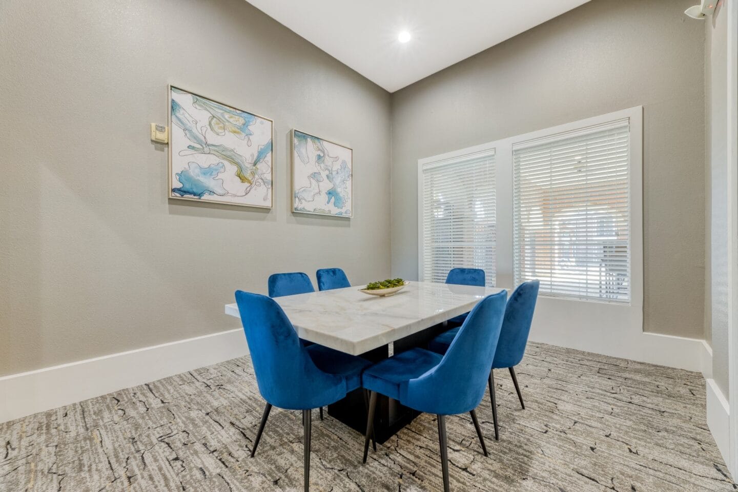 Conference room with meeting table and chairs at Windsor Westbridge, Carrollton, TX