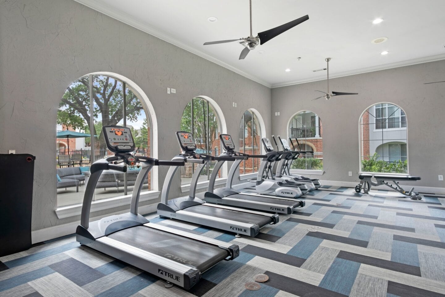 Gym with treadmills and windows at Windsor at Legacy, Plano, TX, 75024