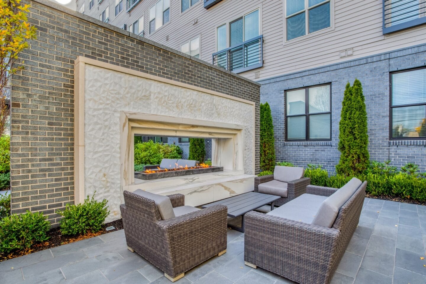 Elevated outdoor living spaces perfect for hosting guests at Windsor Mystic River, Medford, MA