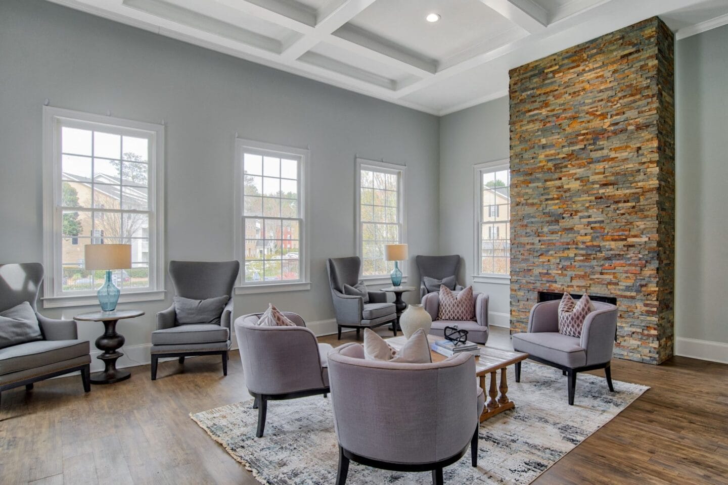 a living room filled with furniture and a fireplace