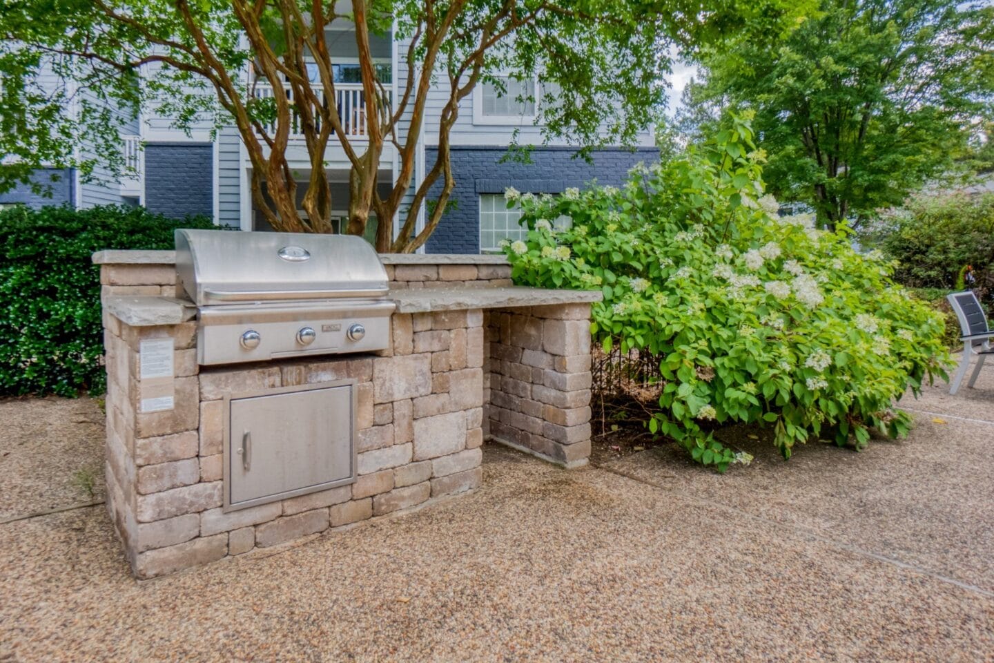 Outdoor grilling area by pool