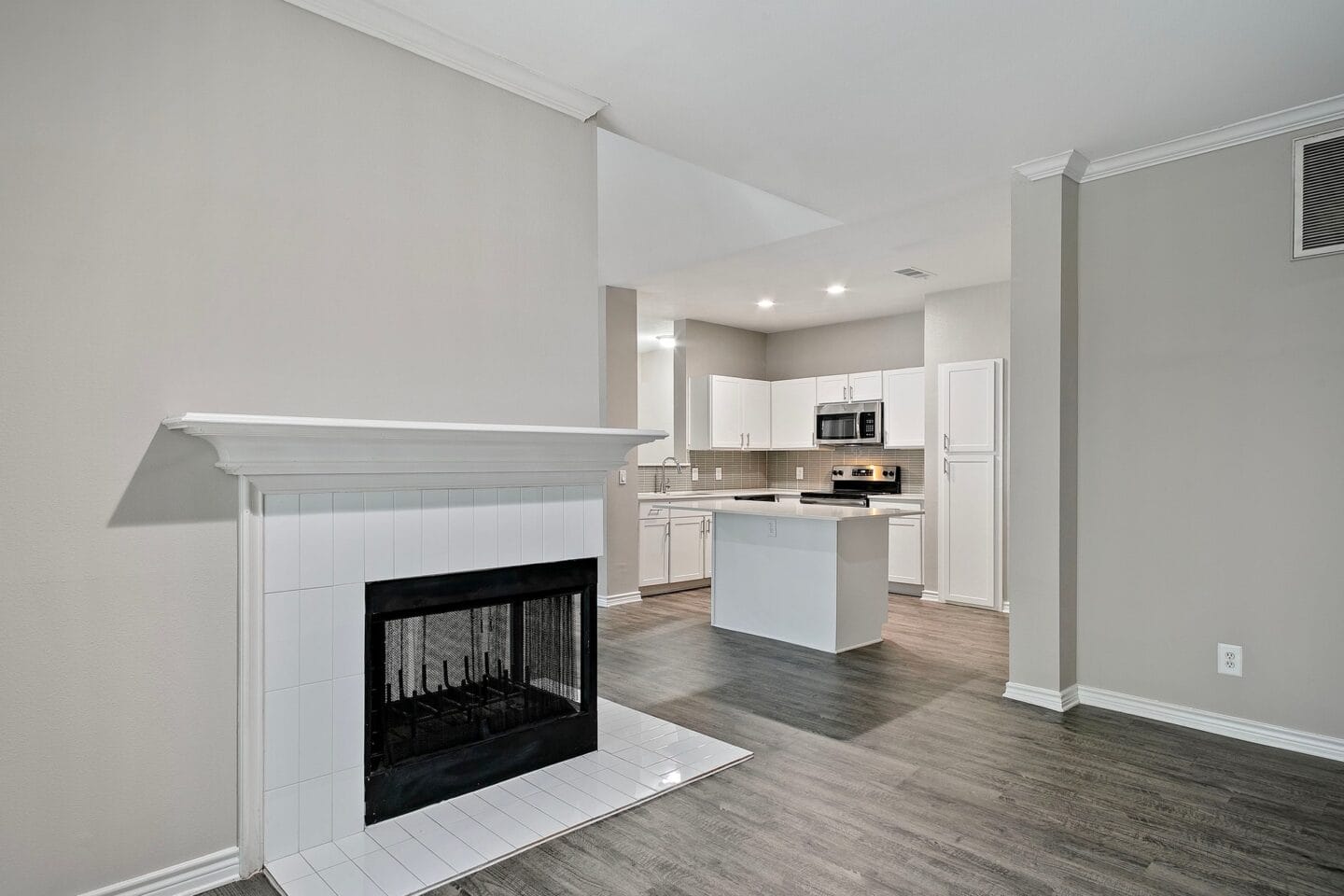 Living room with a fireplace at Windsor at Legacy, Plano, TX, 75024