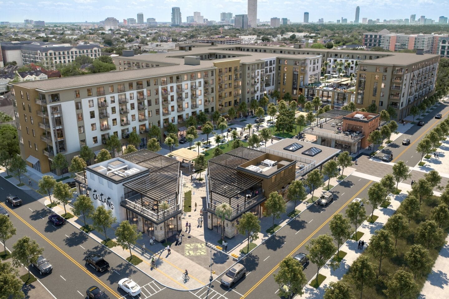 An aerial view of a city street with buildings and trees at The Sterling Houston, TX 77019