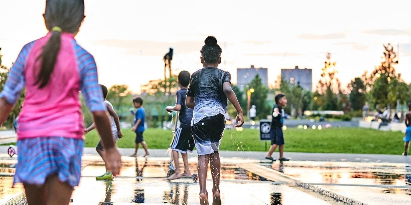 Kids playing in a fountain at Waterline Square Park, 675 West 59th New York, NY 10069