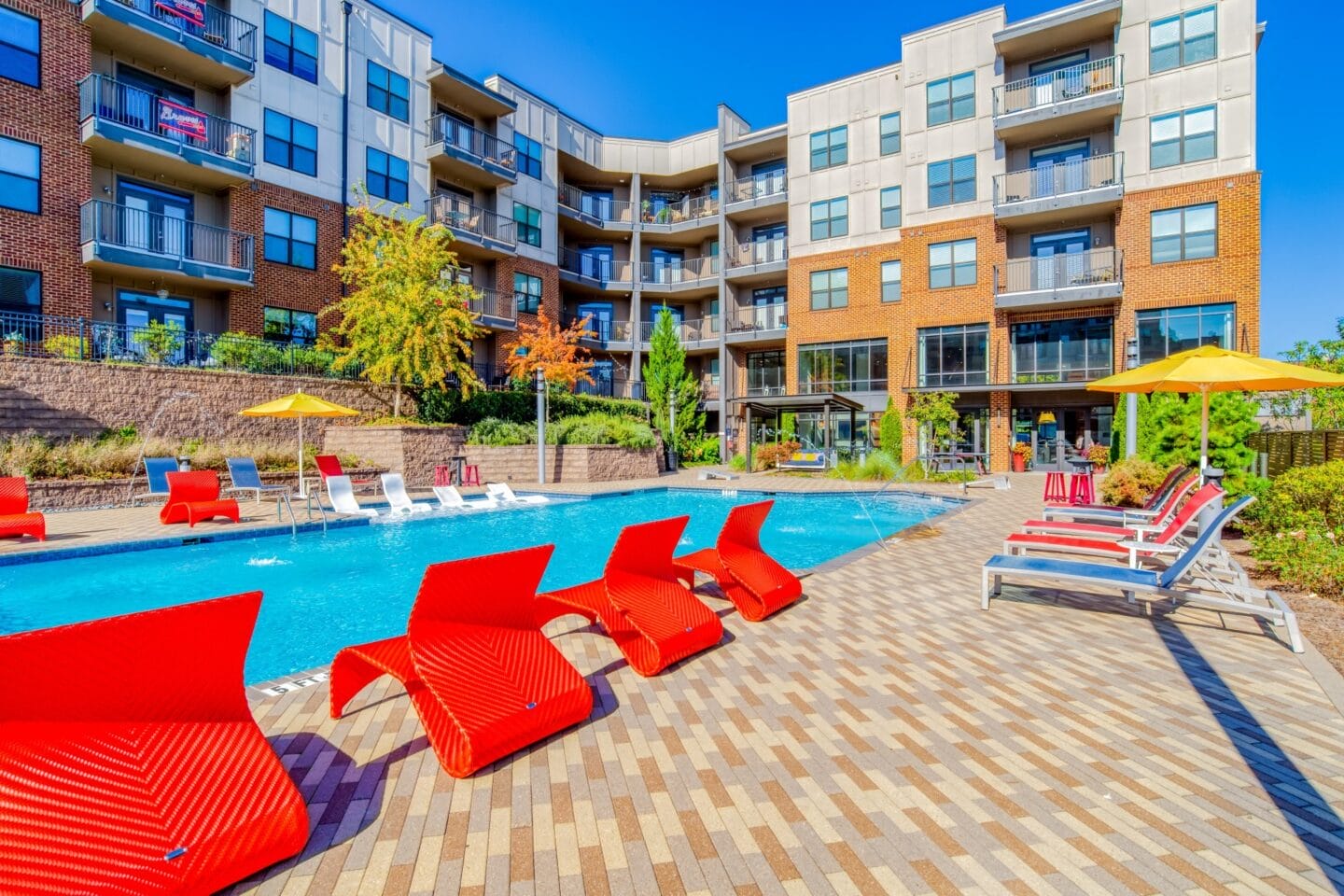 Pool Side Relaxing Area With Sundeck at Stadium Walk By Windsor, Georgia