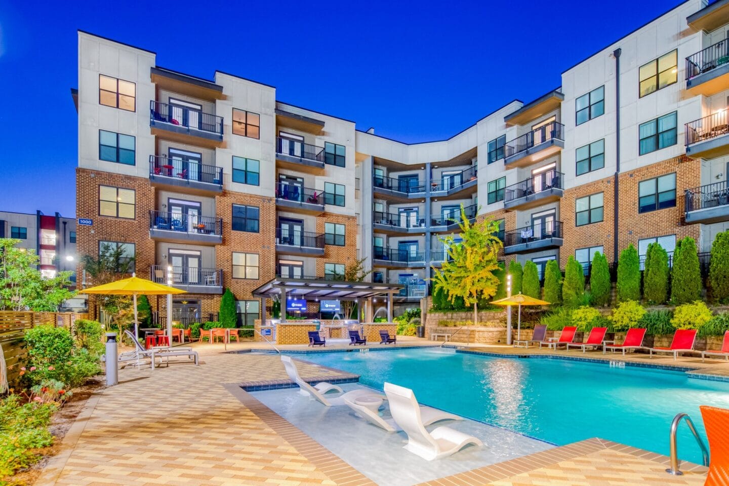 Exterior twilight shot of pool at Stadium Walk by Windsor, Georgia