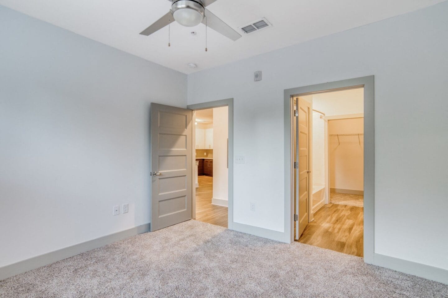 Vacant room with large walk-in closets