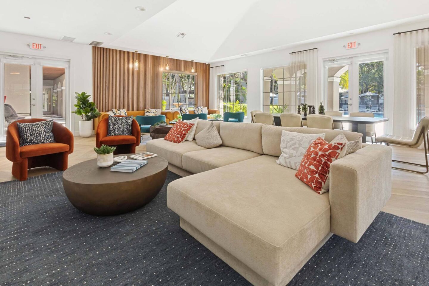 A living room with a large couch and a coffee table.