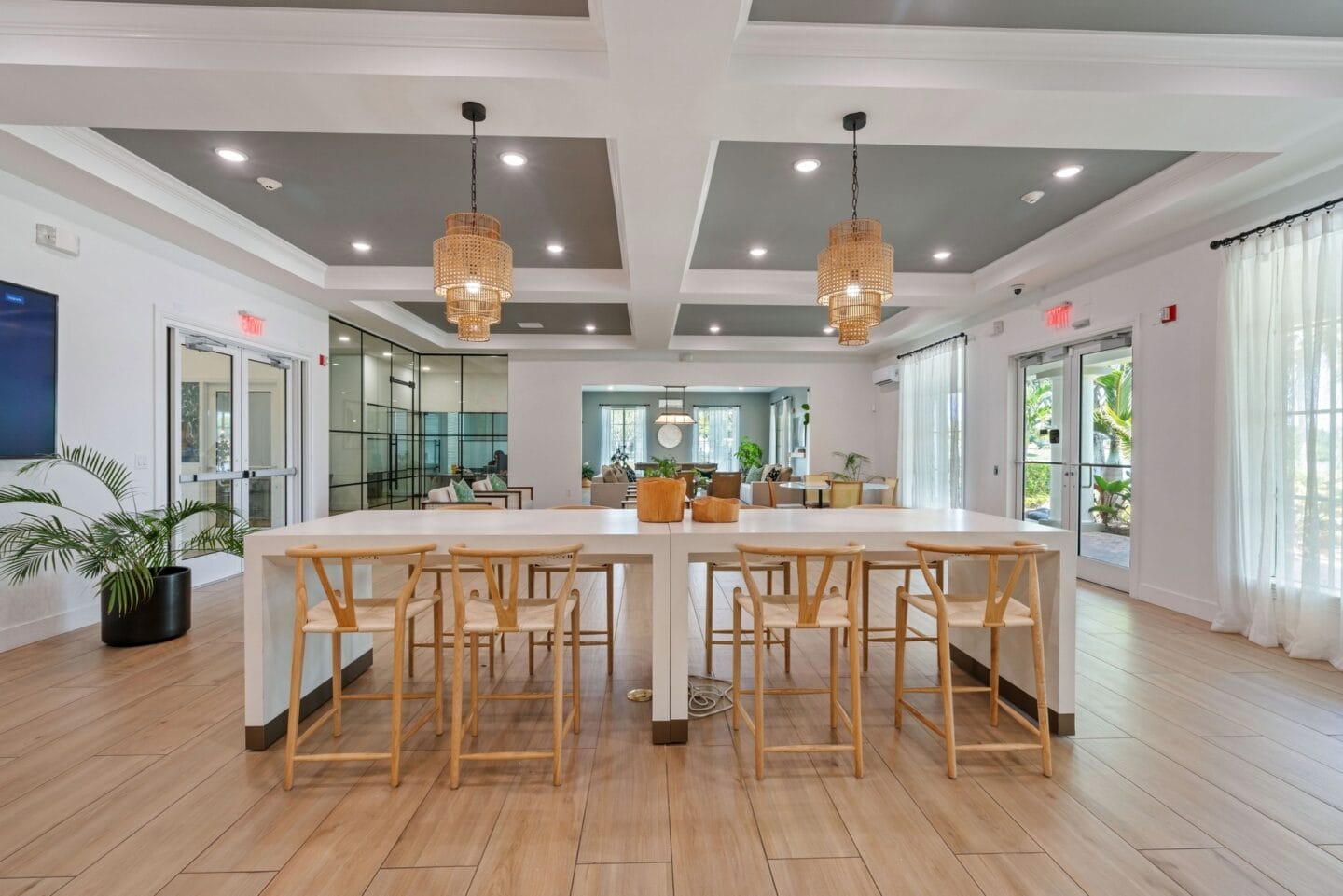 the dining room of a home with a large table and chairs