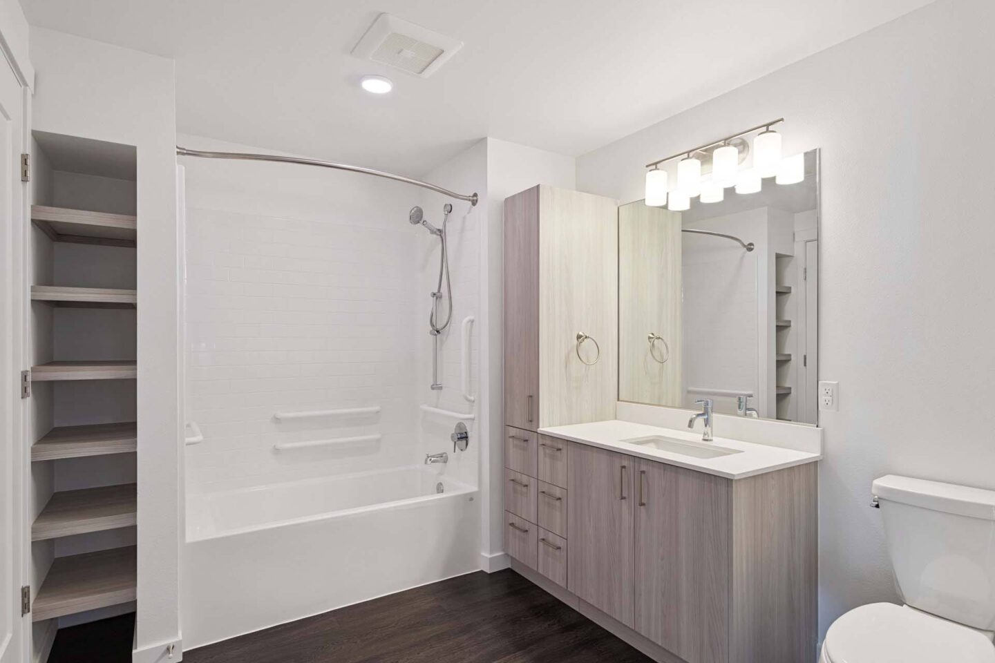 A white bathroom with a walk-in shower and a sink at Windsor Totem Lake, 11723 NE 117th Ct, Kirkland, WA 98034.