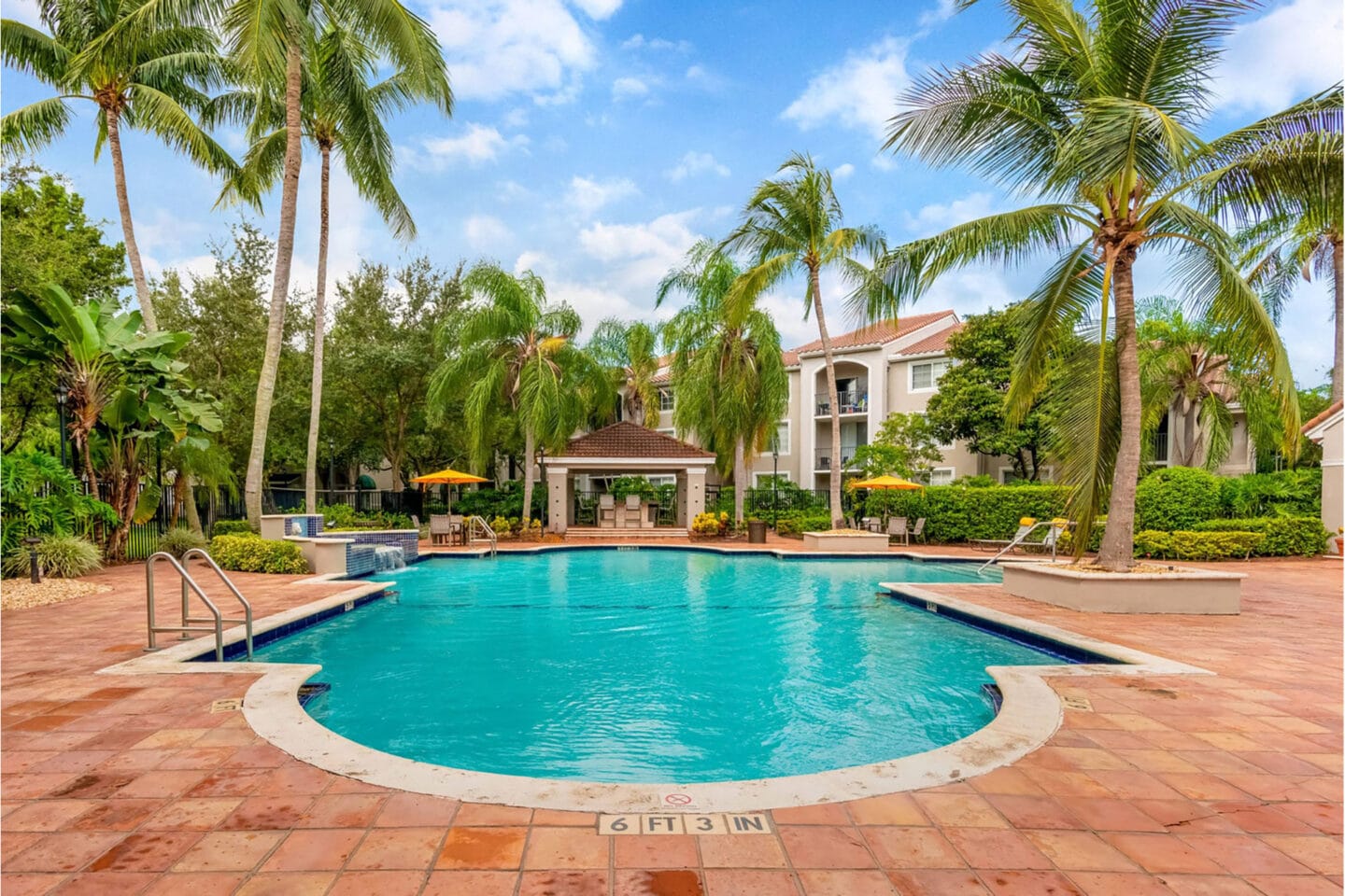 Outdoor Heated Saltwater Pool With Hot Tub Open Year-Round at Windsor Coconut Creek, Florida