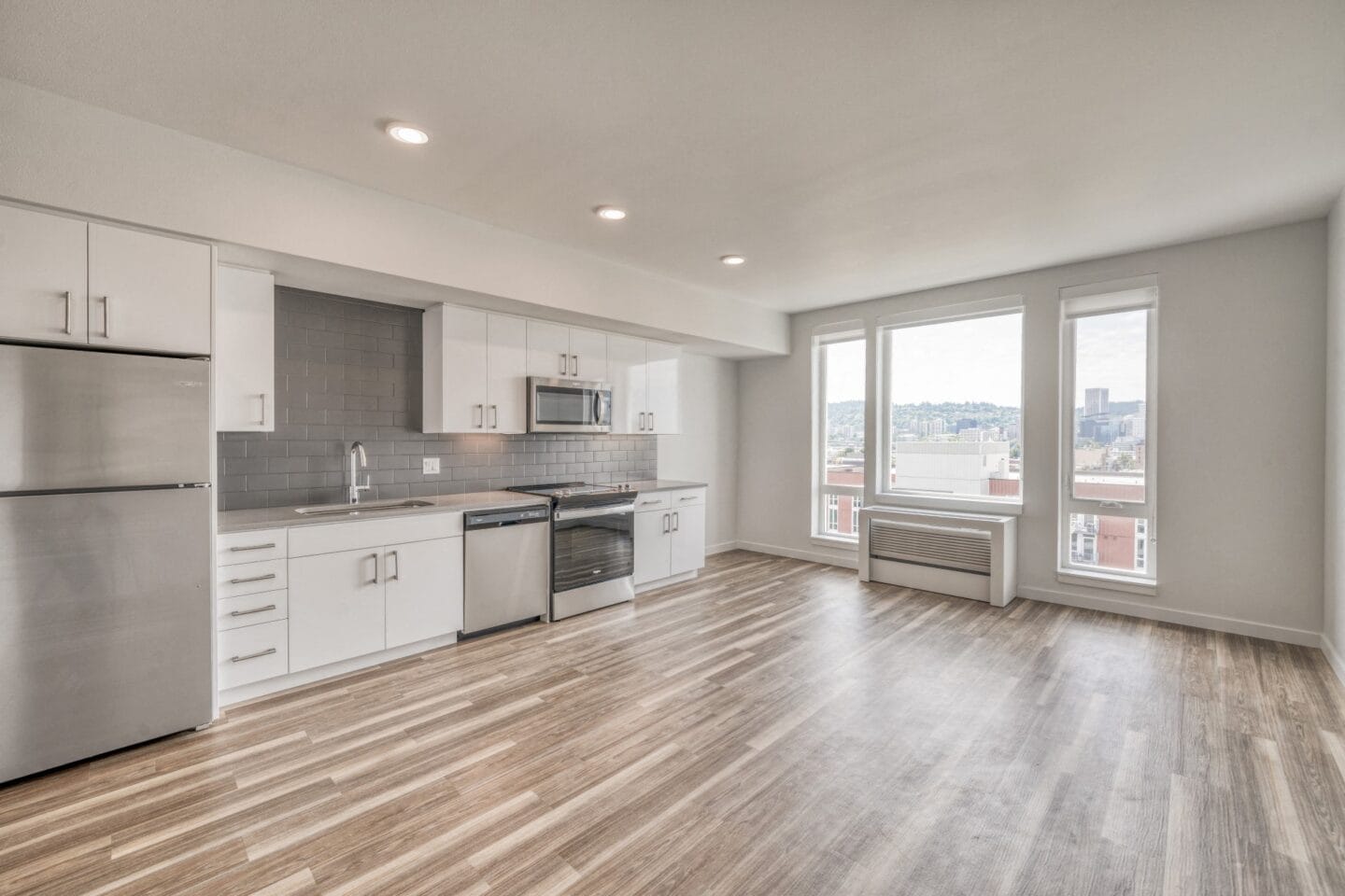 Kitchen and living room in an apartment  at Windsor Buckman, Portland, Oregon