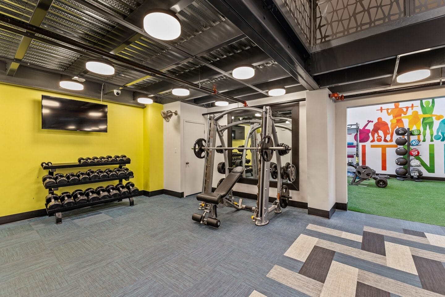 the gym at the flats at big tex apartments