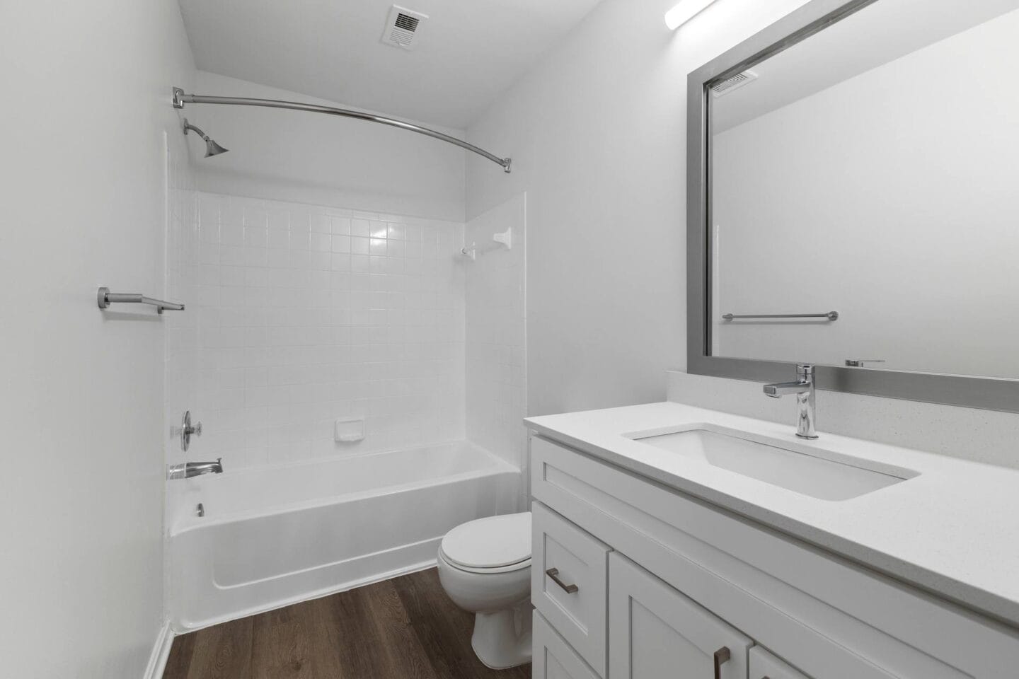 a bathroom with a sink toilet and a tub