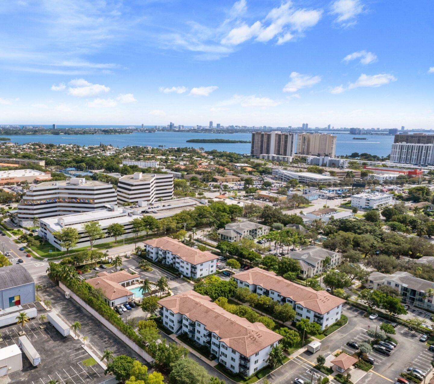 an aerial view of the city and the water