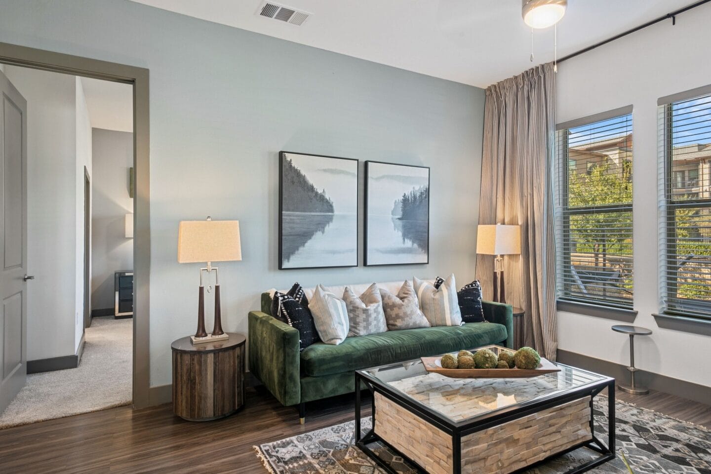 Living room with couch and coffee table at The Lakeyard District