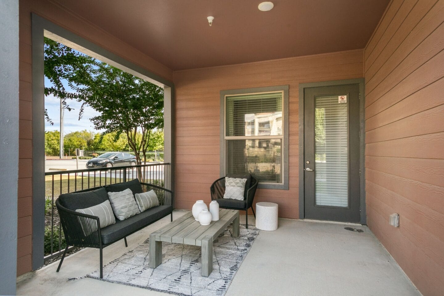 Model balcony with furniture at The Lakeyard District