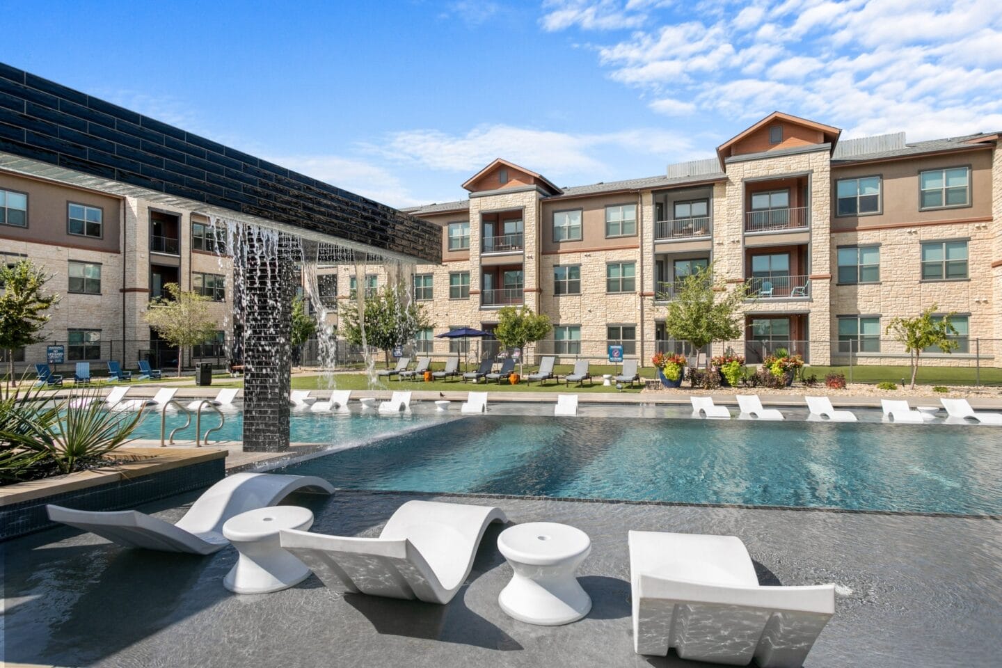 Pool and lounge chairs at The Lakeyard District