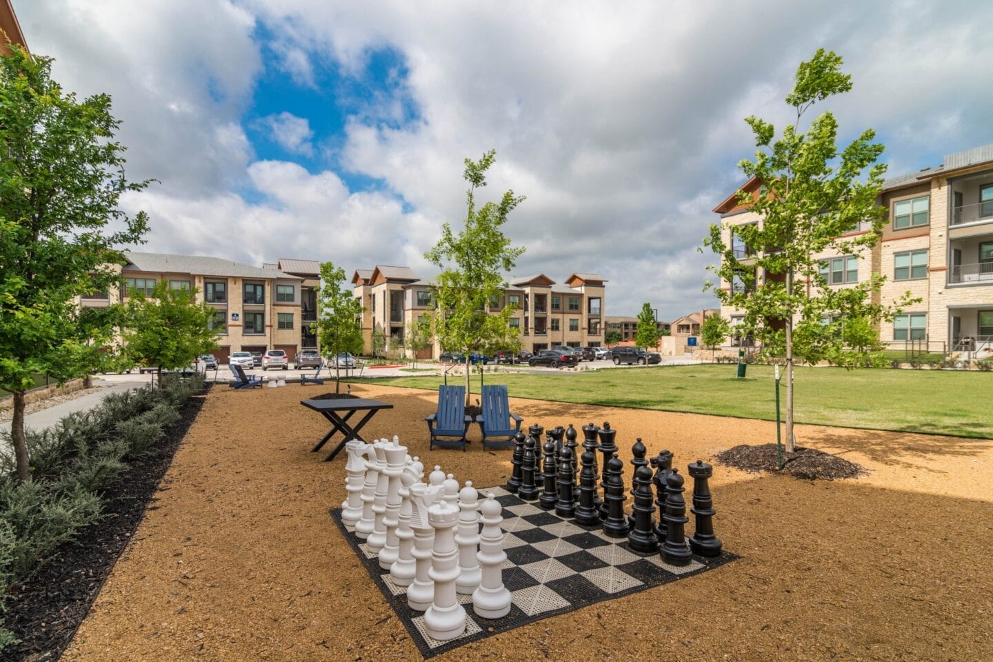 Outdoor Recreation Area with large chess board at Windsor Lakeyard District in the Colony TX