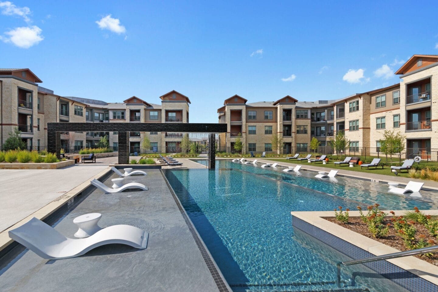 Resort Style Pool with Lounge Area at Windsor Lakeyard District in the Colony TX