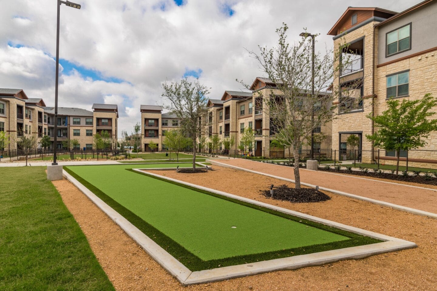 Outdoor Putting Green at Windsor Lakeyard District in the Colony TX