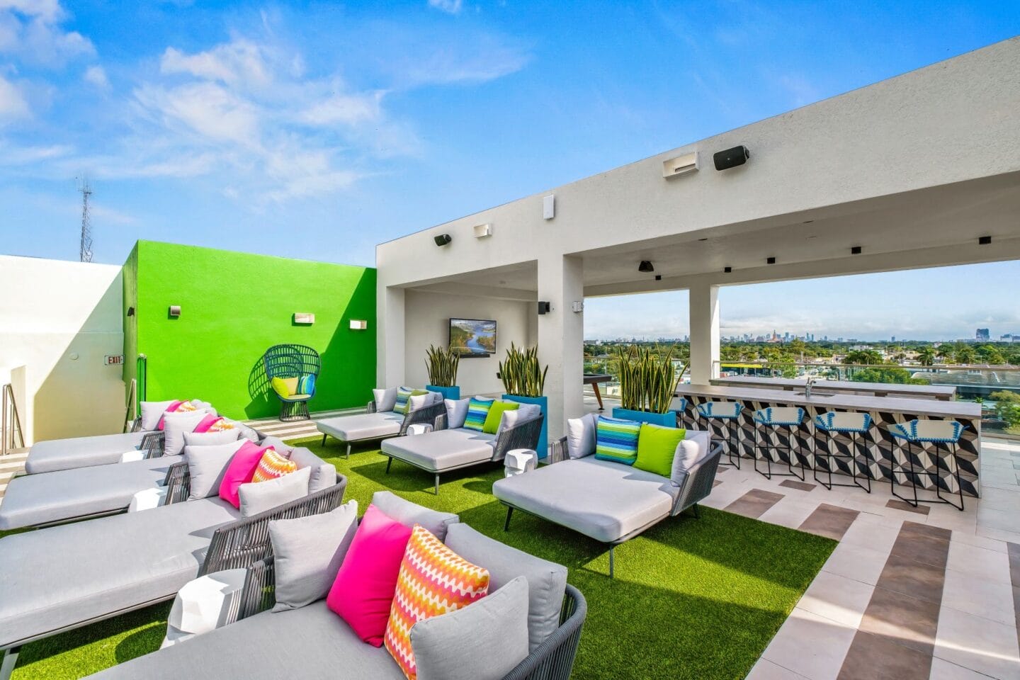 Patio with couches and chairs at Windsor Ludlam Trail in Miami, FL.