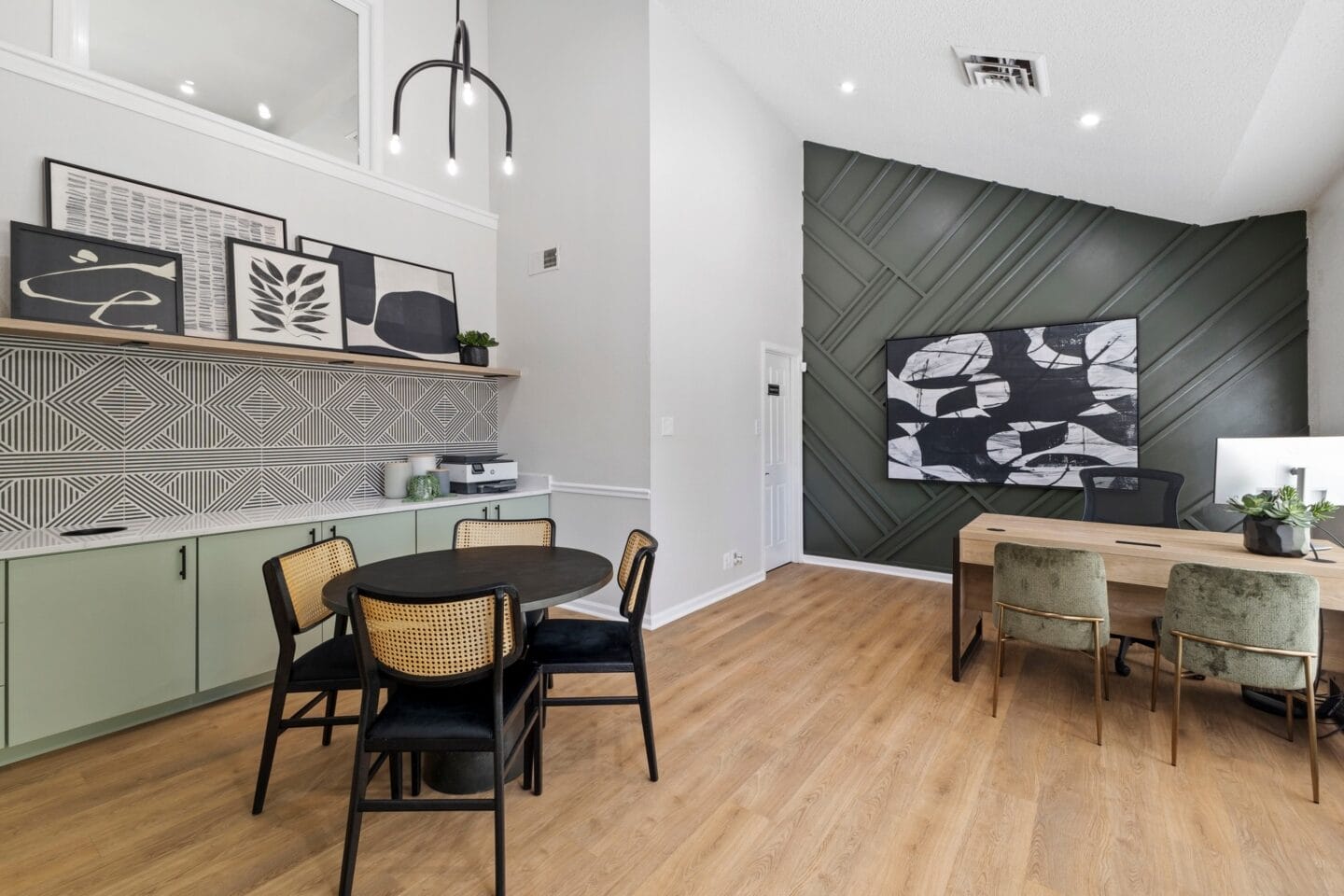 a dining room and living room with a table and chairs