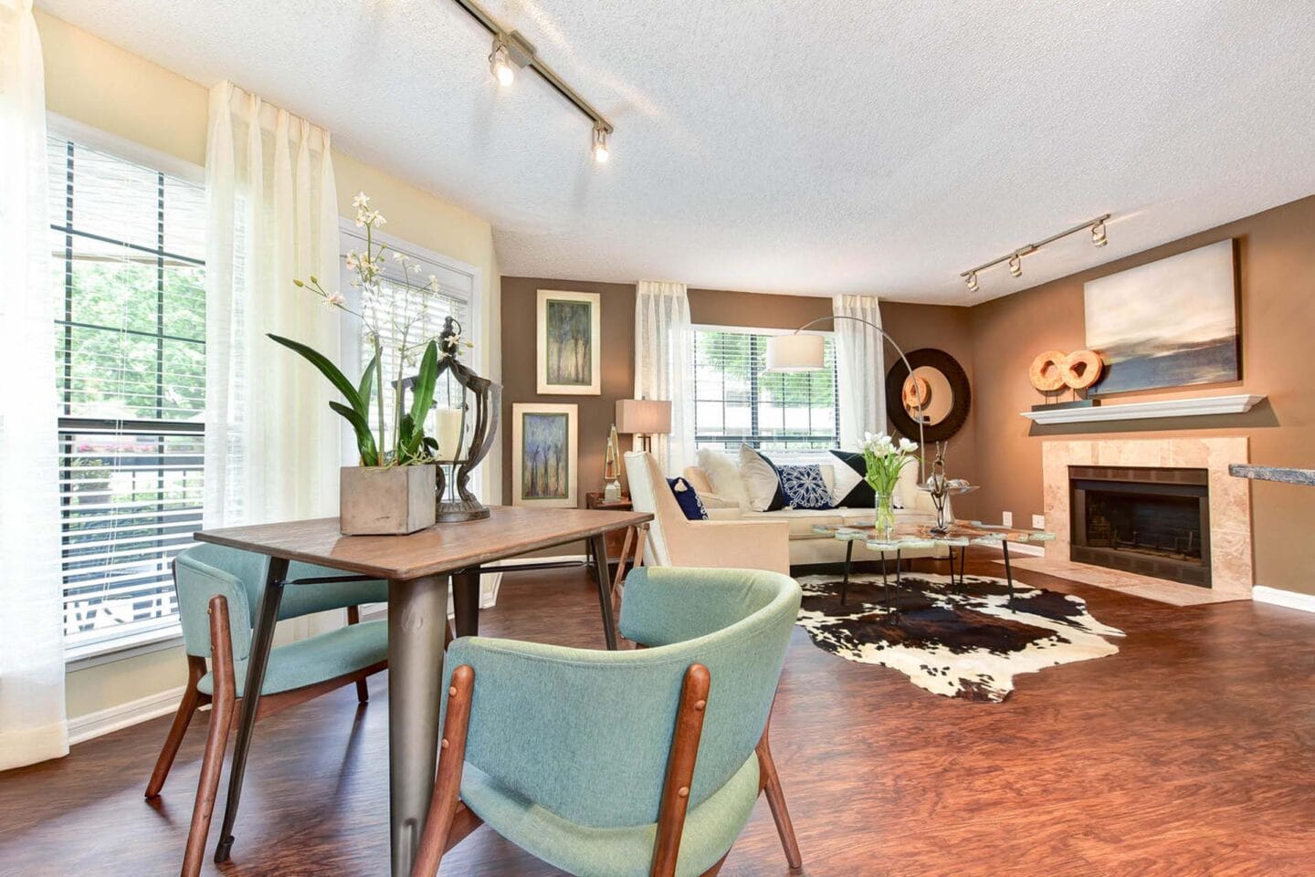 Apartments at Windsor Oak Creek feature living rooms with a fireplace in some units.