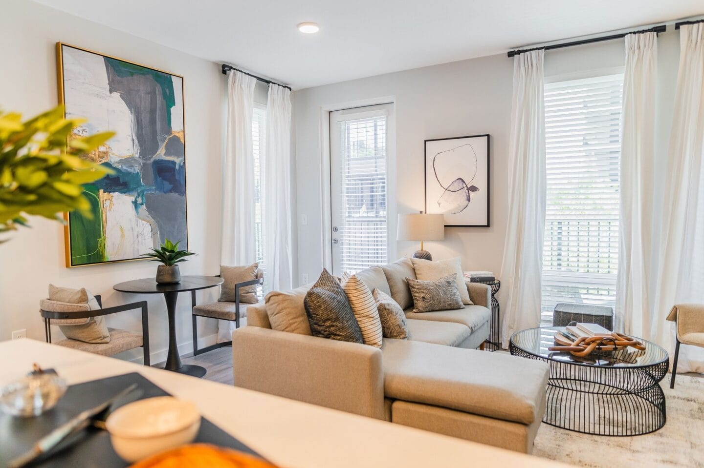 a living room with a couch and a table