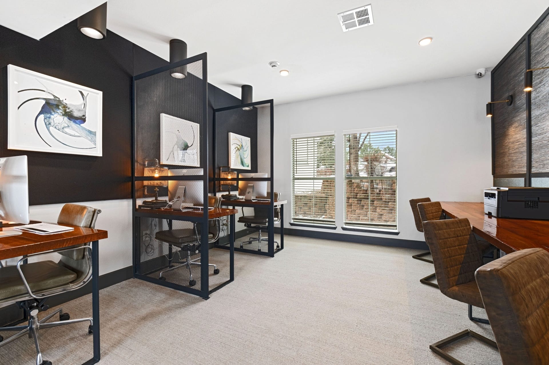 Conference room with desks and chairs and a window at Windsor Westminster, Westminster, Colorado