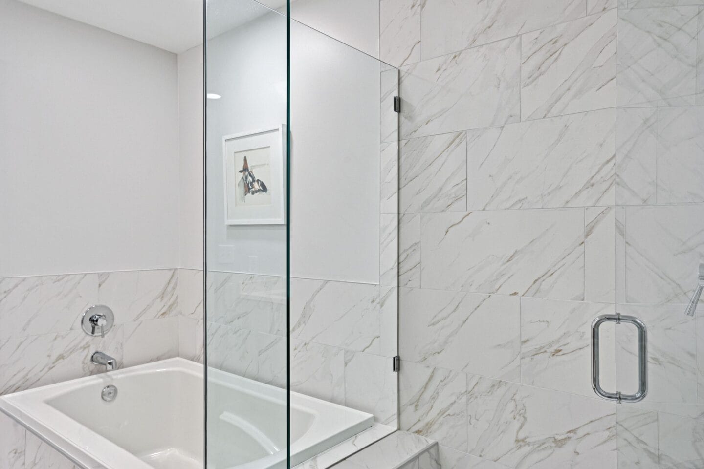 a bathroom with a shower and a sink and a bath tub