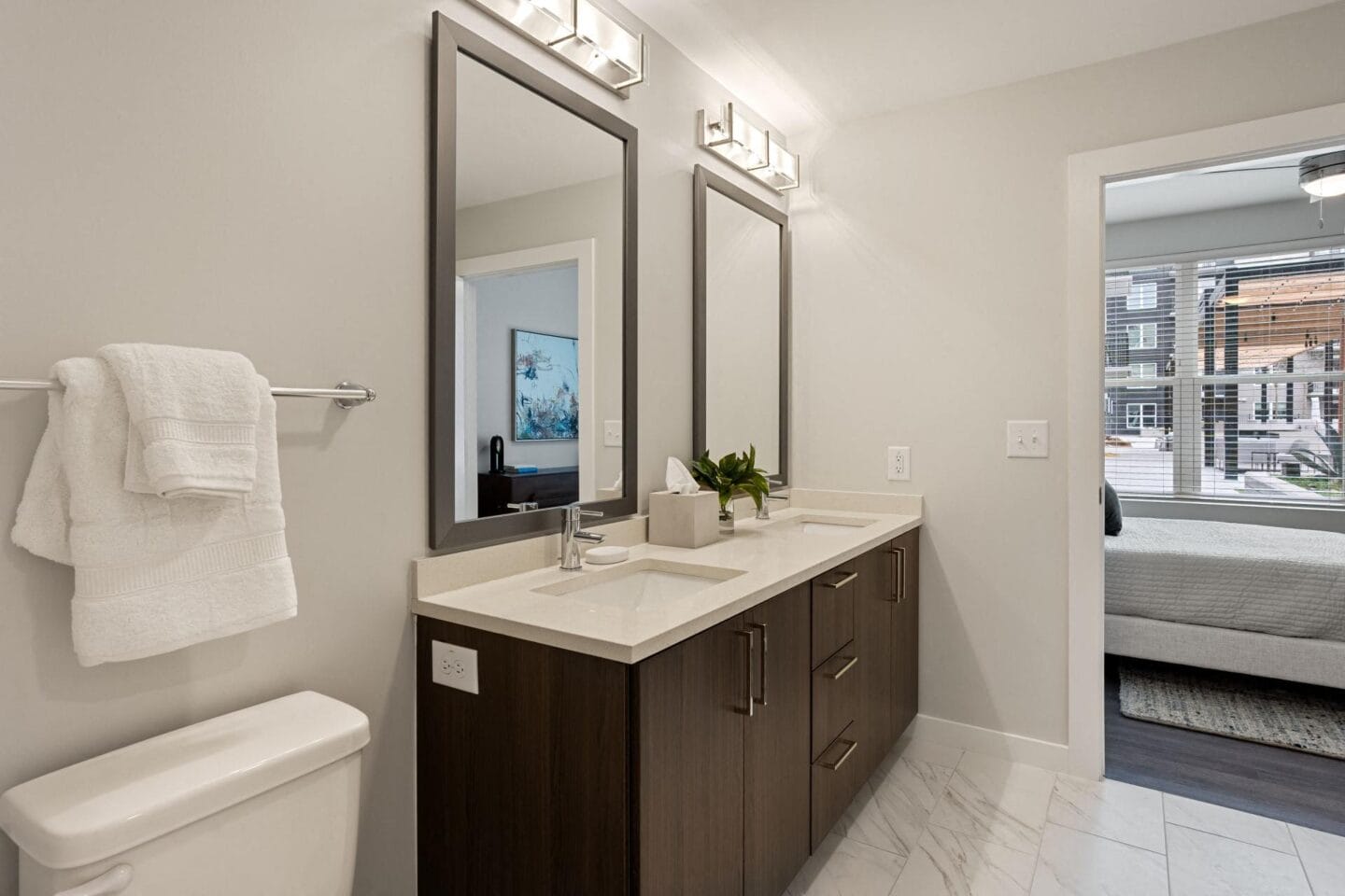 a bathroom with a large mirror and a sink