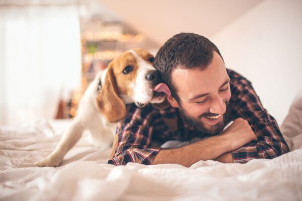 man with dog at pet friendly apartment