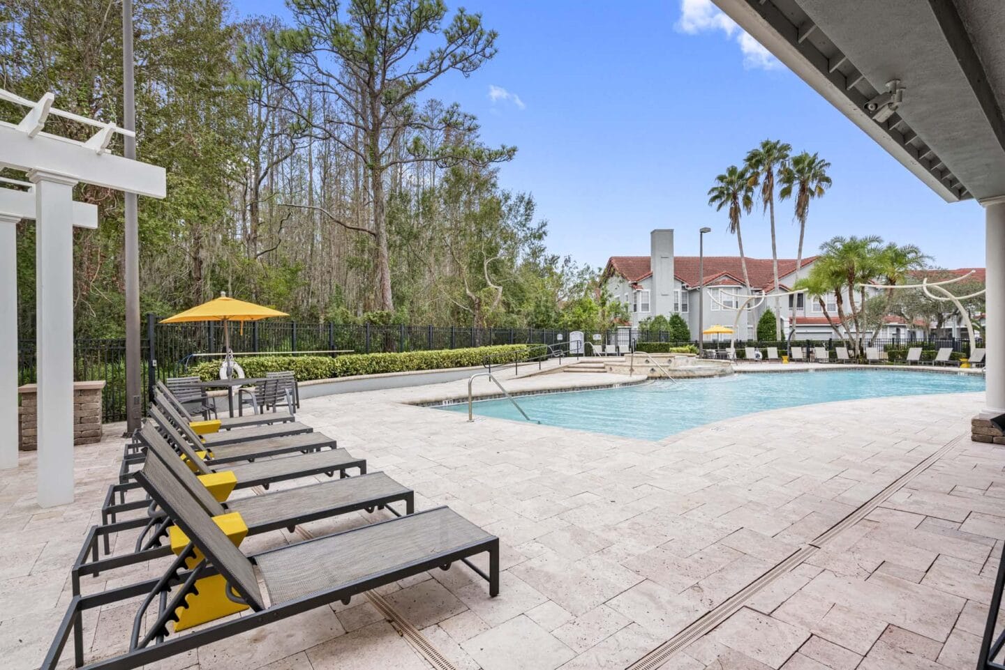 Relaxing Pool with seating areaat Windsor Highwoods Preserve, Tampa, FL 33647