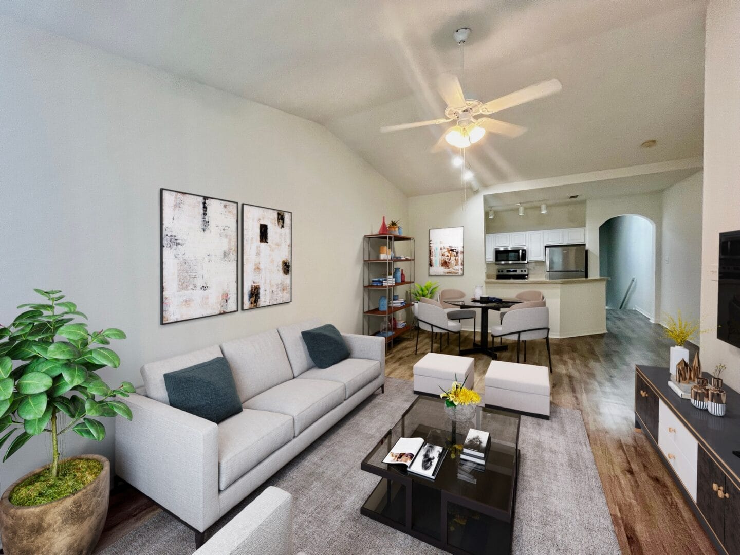 a living room with a white couch and a coffee table